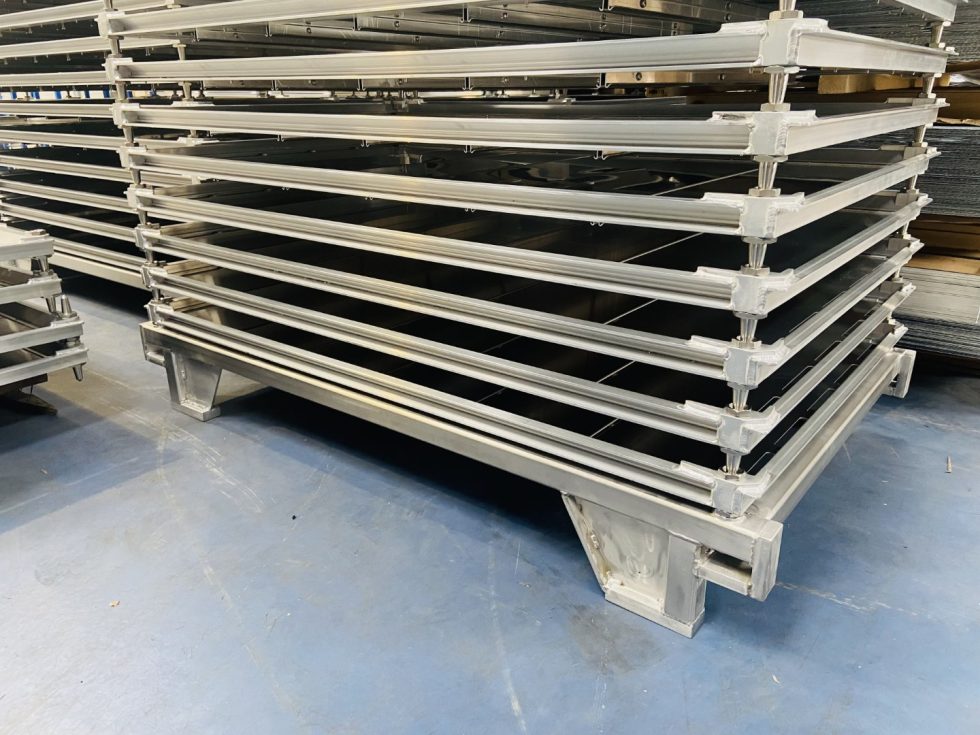 Sterilization trays with skids (base) and stacking pins